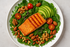 Colorful meal with greens, salmon, olive oil, and nuts.